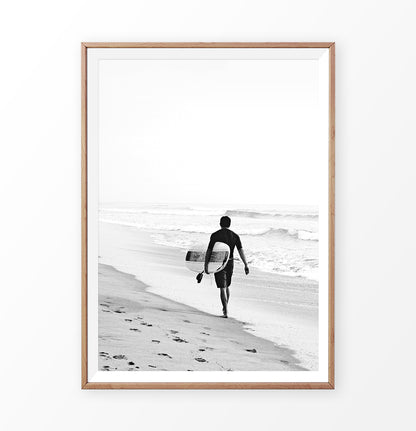 Black and surfer print, surfer walking alone on the beach