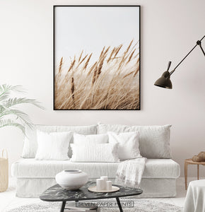 Brown reed field large wall art above white sofa