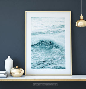 ocean waves art print on the table