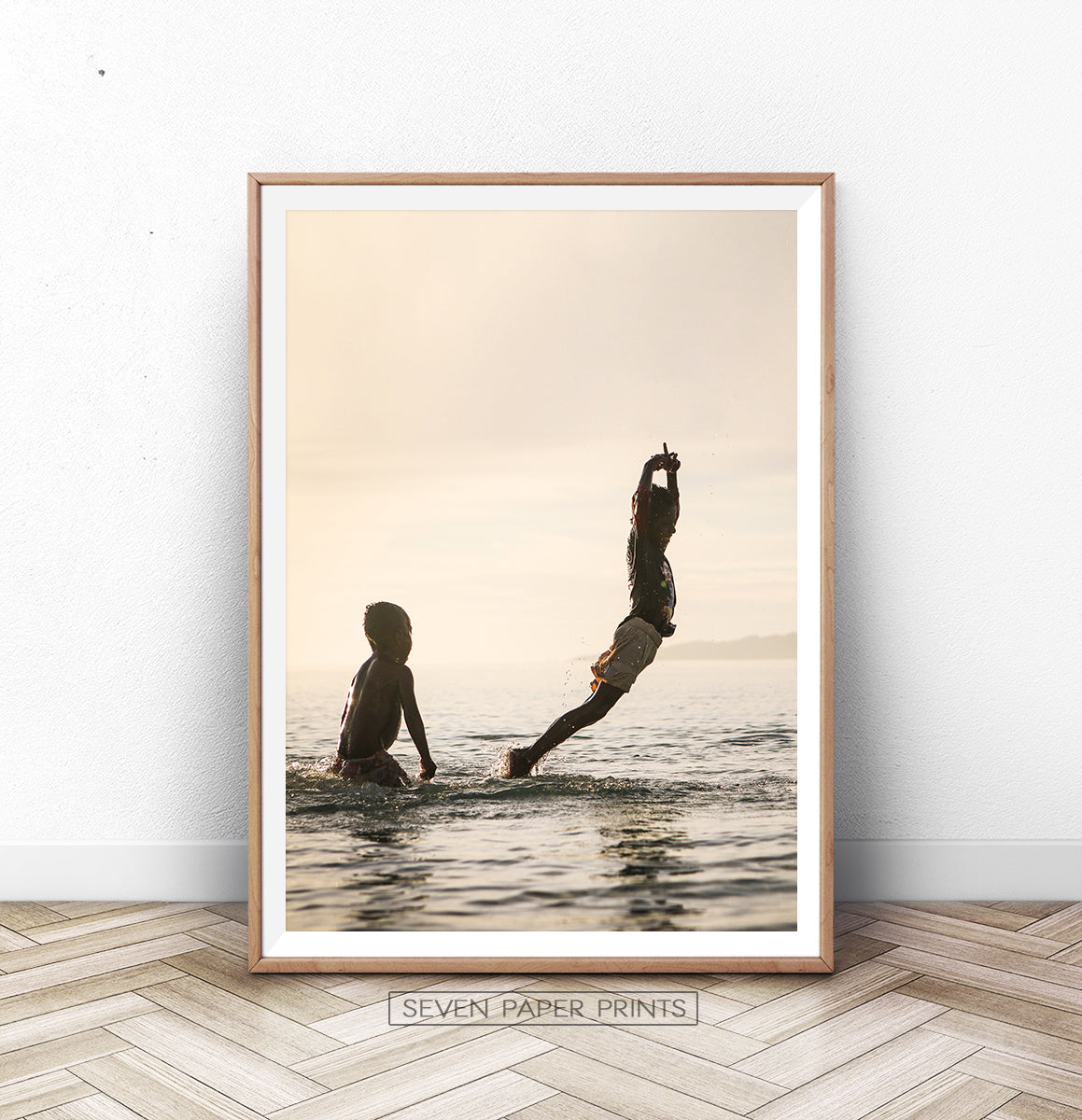 Boys Jumping Into Ocean Wall Art