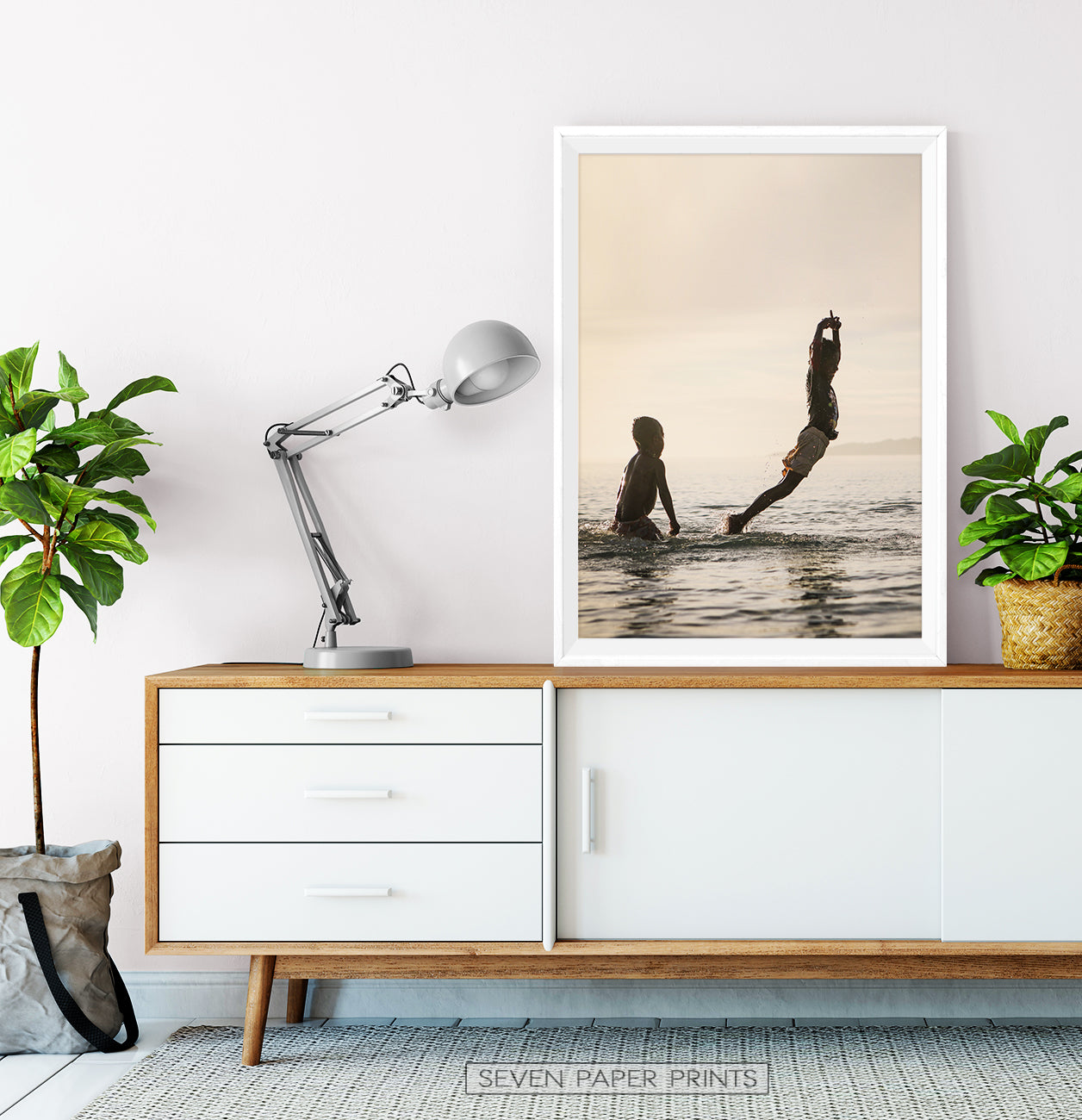 Boys Jumping Into Ocean Wall Art