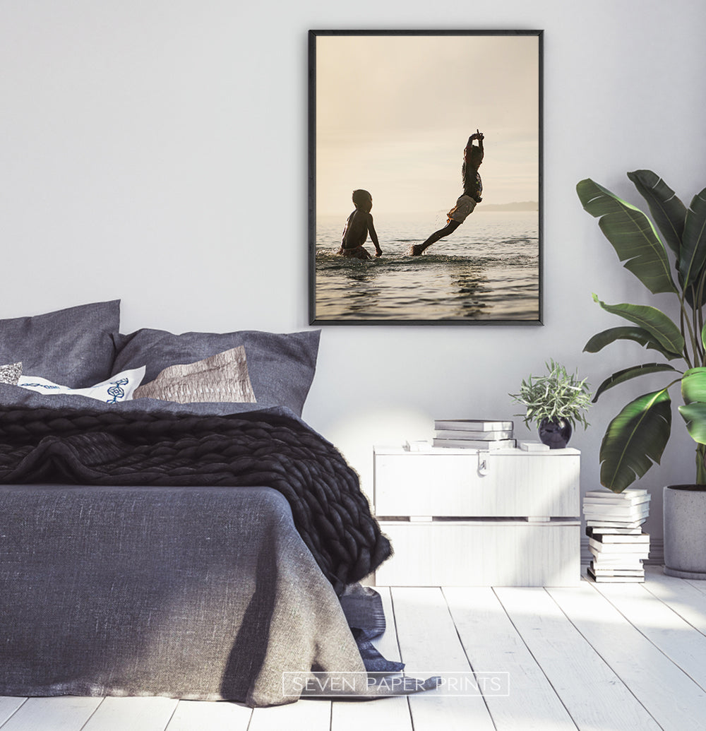 Boys Jumping Into Ocean Wall Art