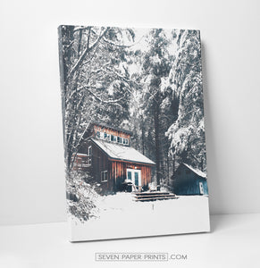 Snowy Cabin in a forest canvas print