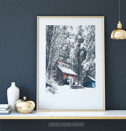 Golden-framed on a white marble shelf