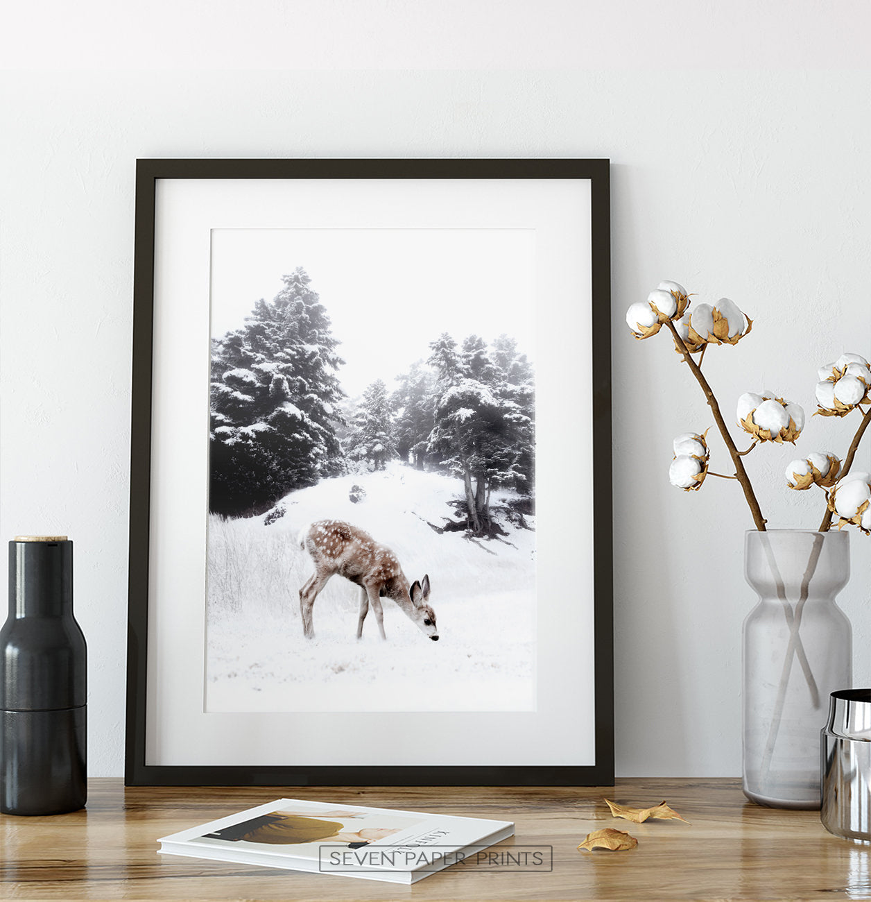 Black-framed on a wooden shelf