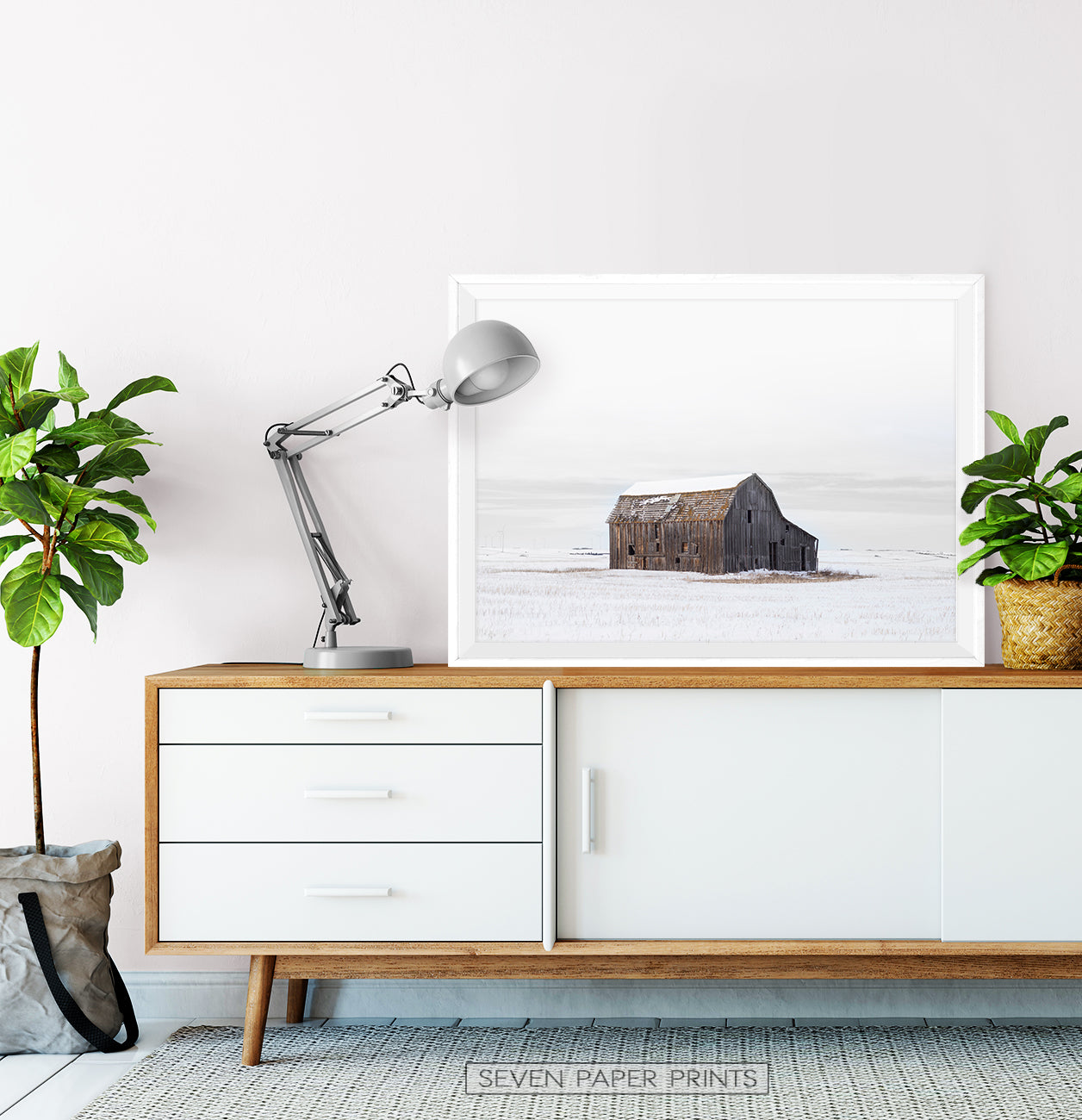 White-framed on a wooden cabinet