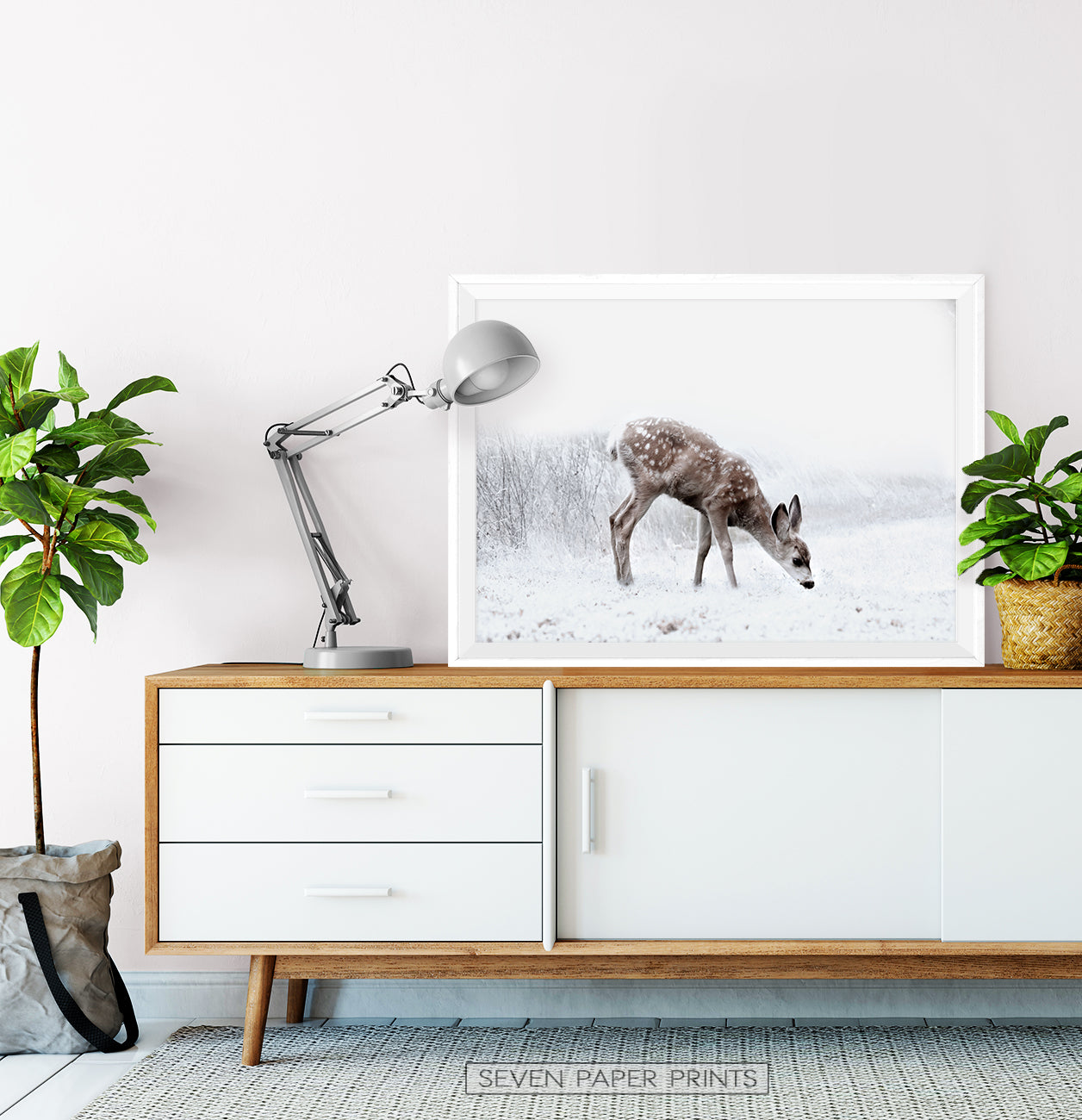 White-framed on a wooden cabinet
