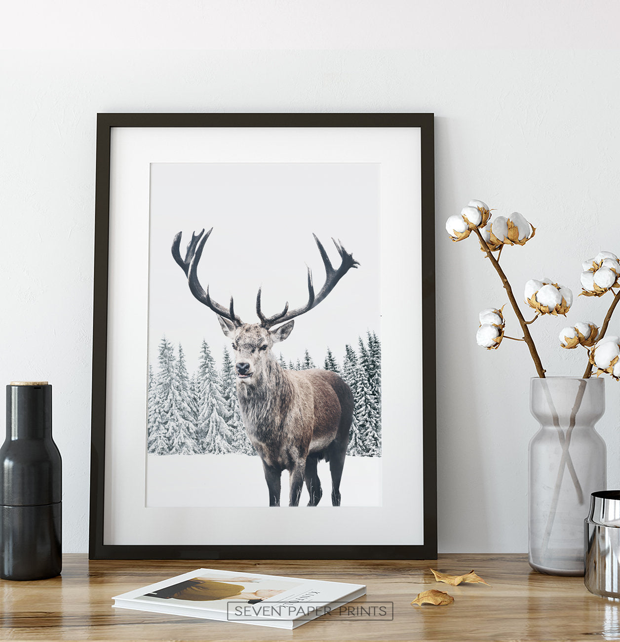 Black-framed on a wooden shelf