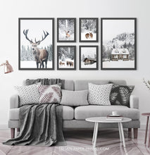 Load image into Gallery viewer, Reindeers, Sheep and Houses - Winter Black-Framed 6-Piece Set in the living room

