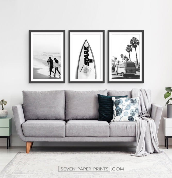Black and white surfing décor. Surfboard, surfers and travel bus with palms