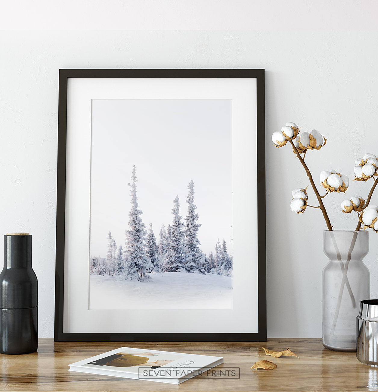 Black-framed on a wooden table