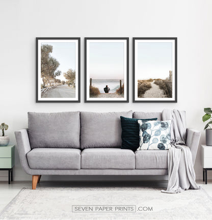 Surfer on the Sandy Ocean Beach Framed Prints