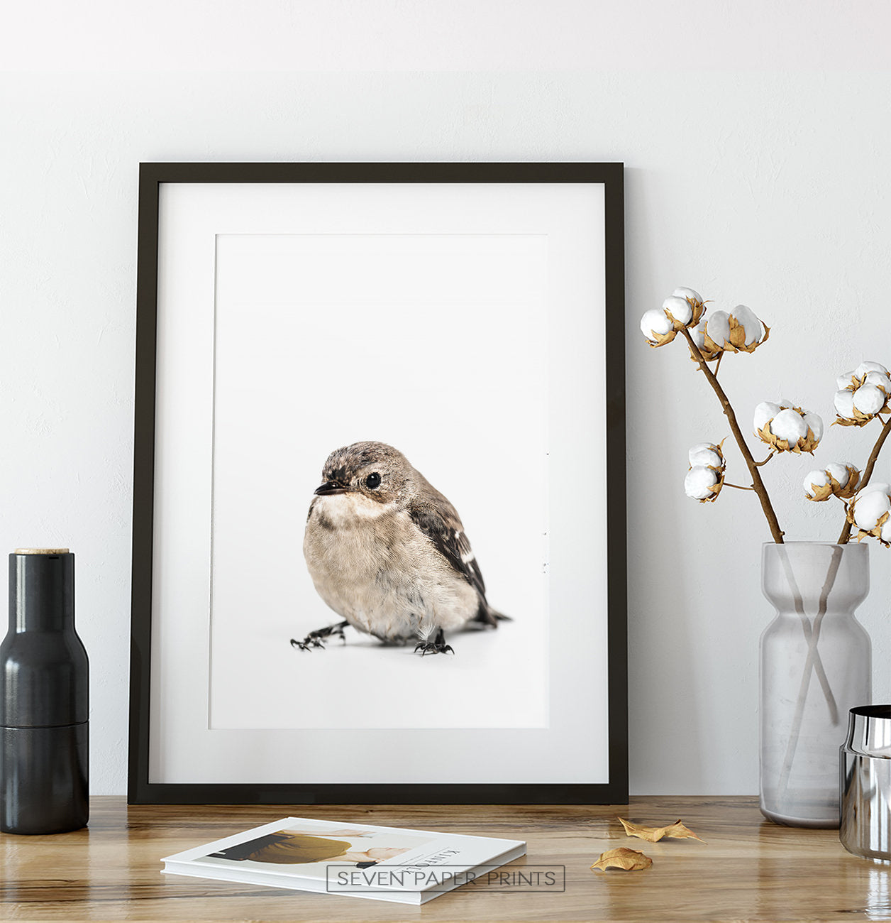 Black-framed on a wooden table