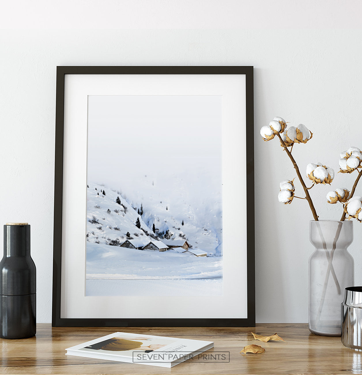 Black-framed on a wooden table