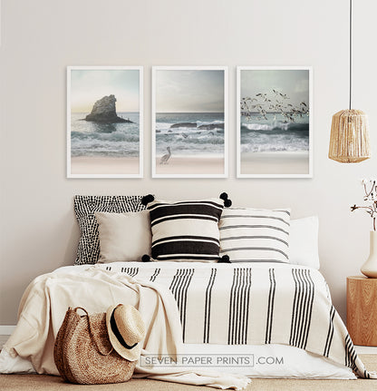 Three framed prints with a stormy ocean landscape 2