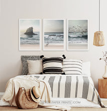 Load image into Gallery viewer, Three framed prints with a stormy ocean landscape 2
