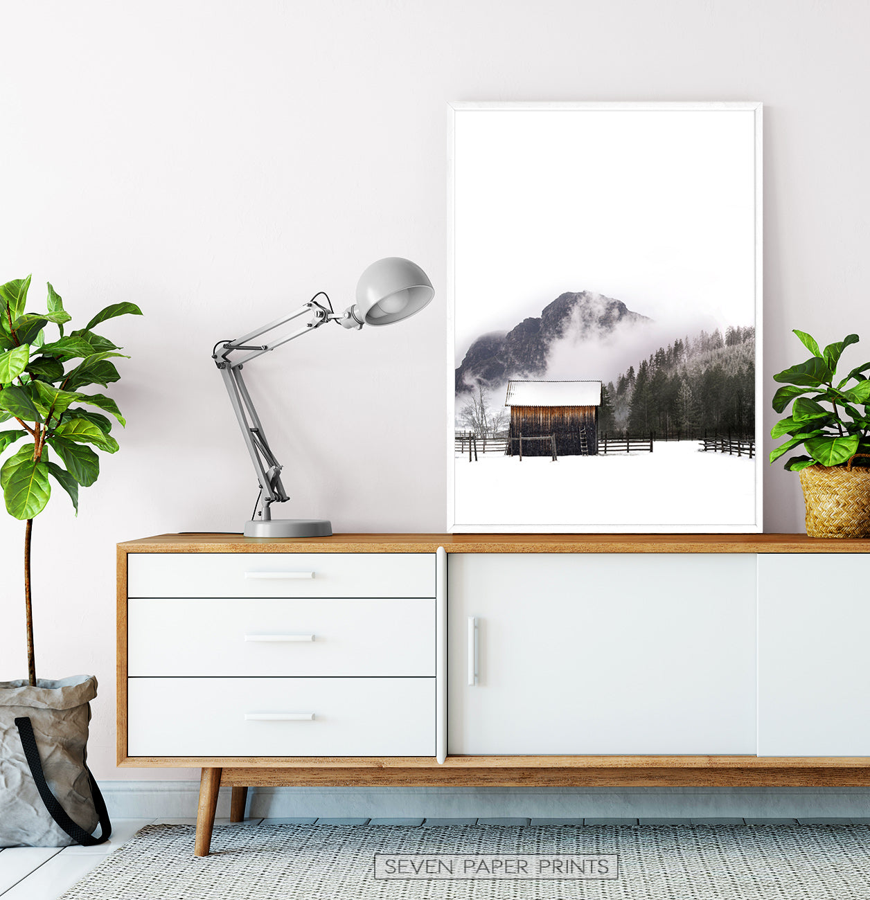 White-framed on a wooden cabinet