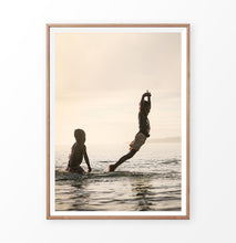 Load image into Gallery viewer, Boys jumping into the sea, summer fun photograph
